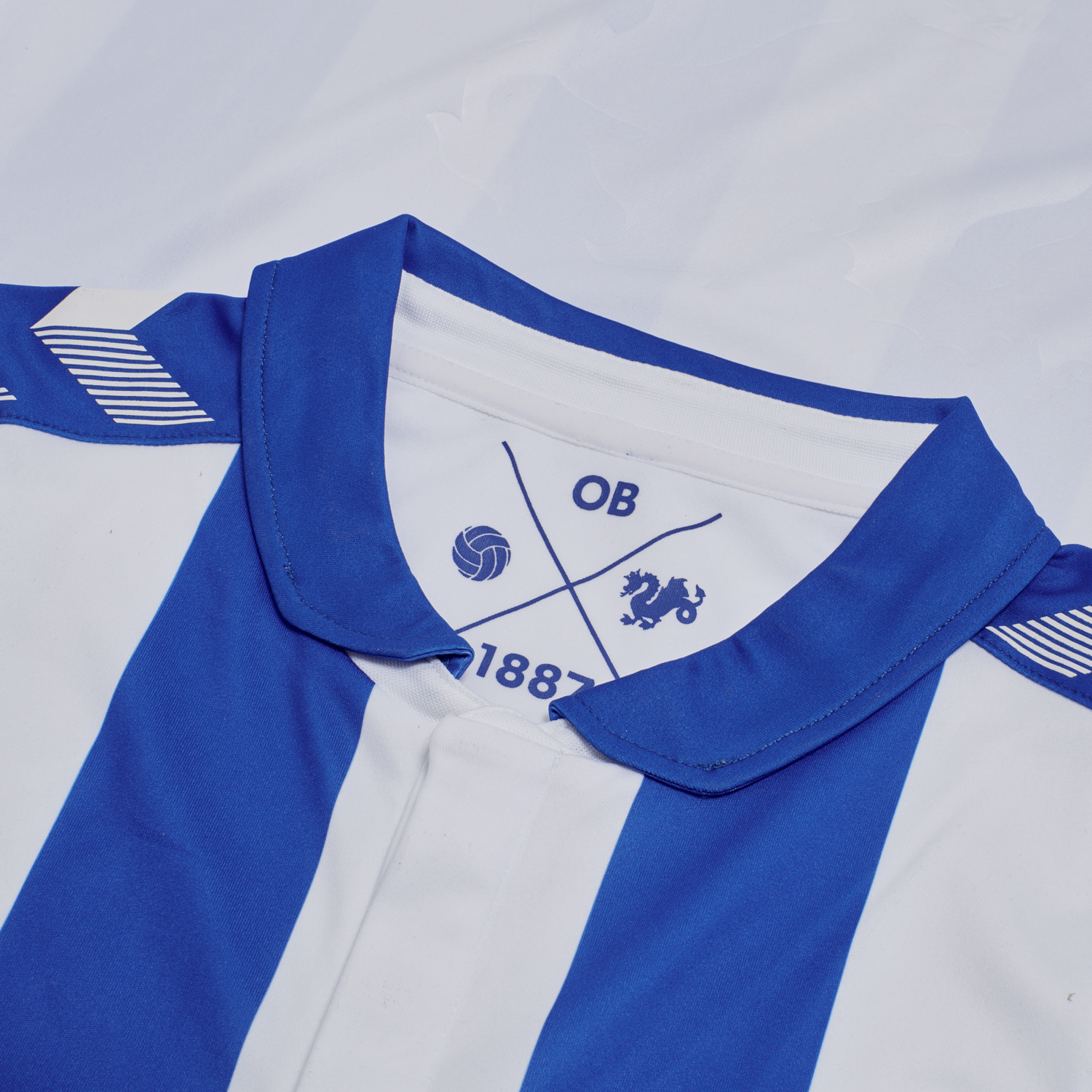 OB 20/21 HOME JERSEY S/S _KIDS, WHITE/LAPIS BLUE UNSPONSORED, packshot