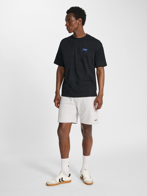 hmlLOOSE T-SHIRT S/S HSW FOOTBALL, BLACK, model